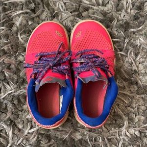 Kids Nike running shoe.